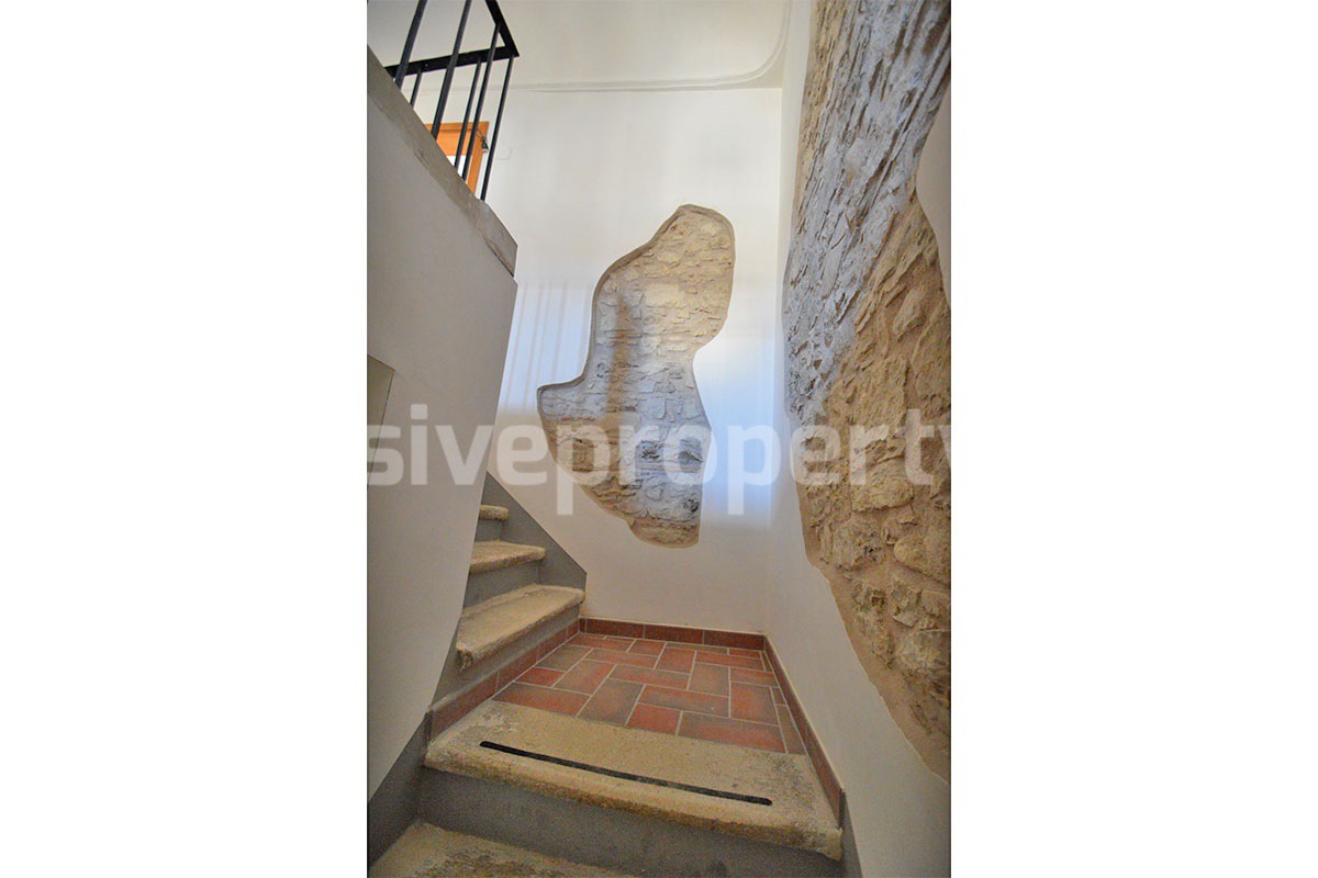 Stone Apartment for Sale in Abruzzo - Renovated Home with Balcony - Views and Historic Marble Portal