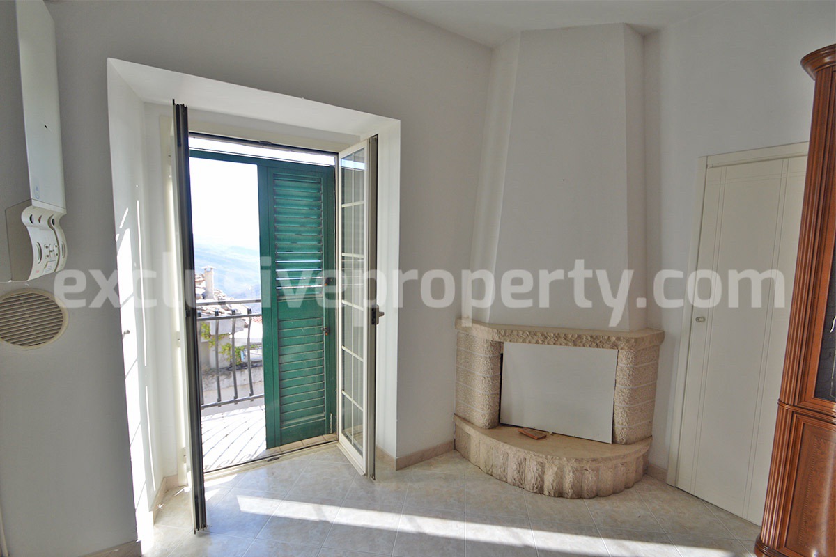 Stone Apartment for Sale in Abruzzo - Renovated Home with Balcony - Views and Historic Marble Portal