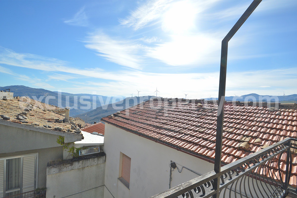 Stone Apartment for Sale in Abruzzo - Renovated Home with Balcony - Views and Historic Marble Portal