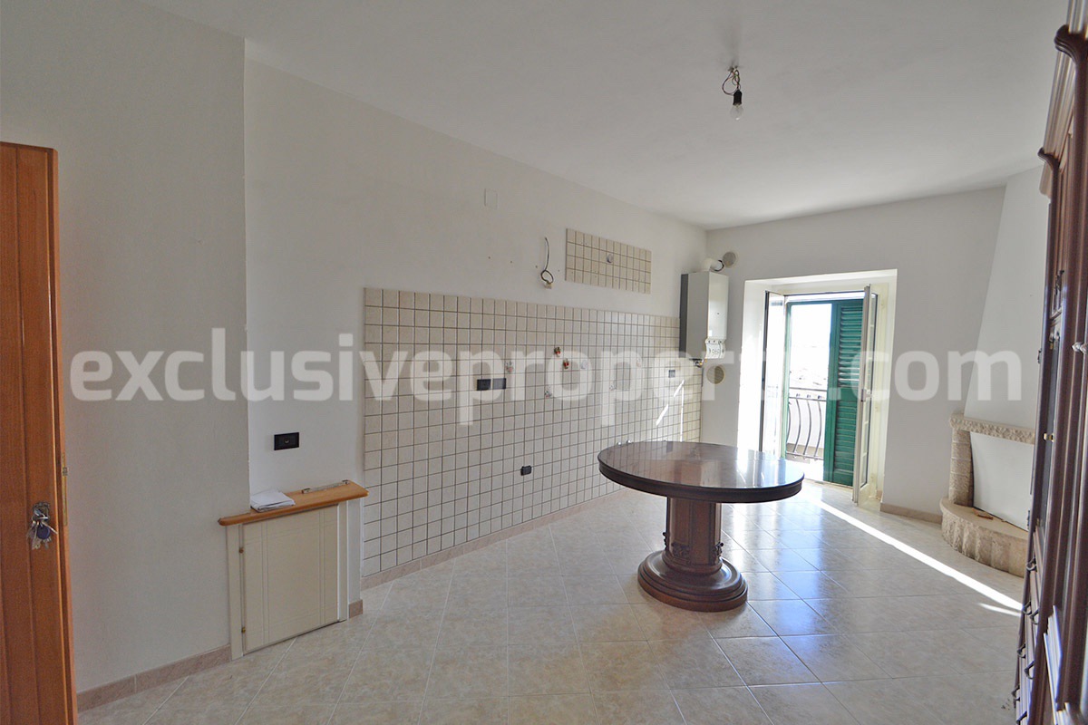 Stone Apartment for Sale in Abruzzo - Renovated Home with Balcony - Views and Historic Marble Portal