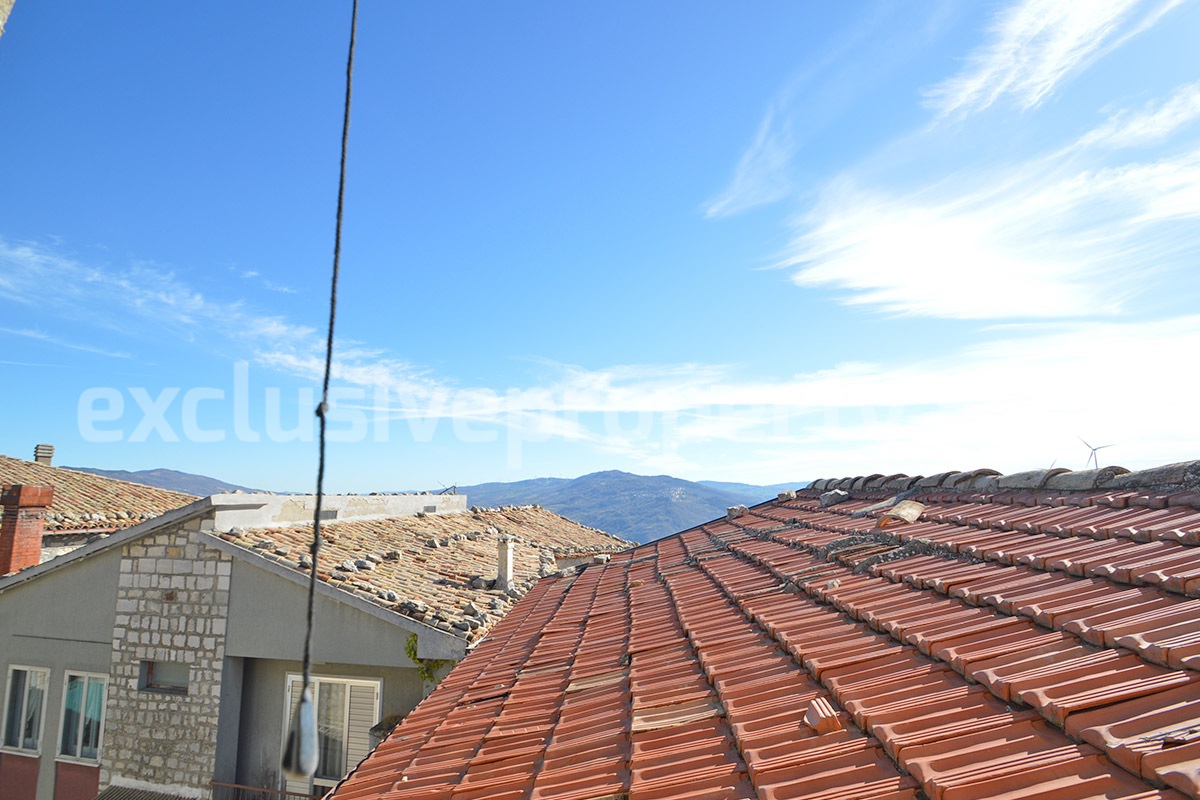 Stone Apartment for Sale in Abruzzo - Renovated Home with Balcony - Views and Historic Marble Portal
