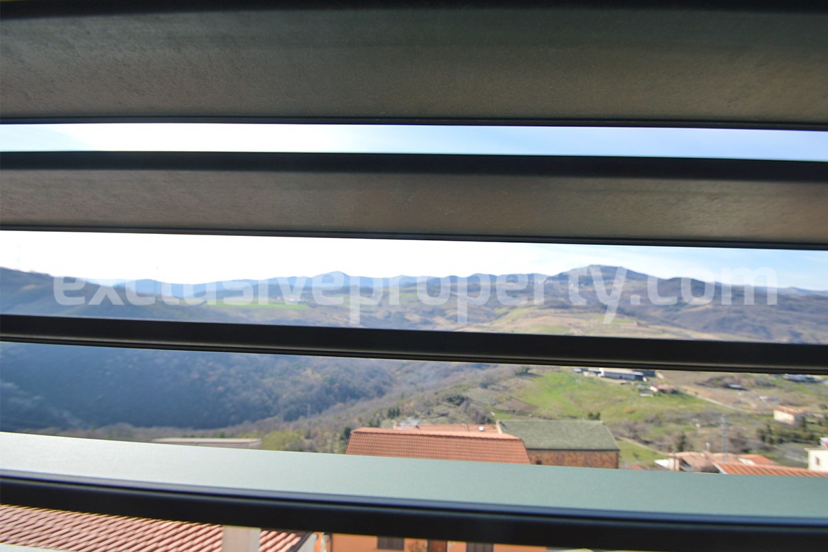 Stone Apartment for Sale in Abruzzo - Renovated Home with Balcony - Views and Historic Marble Portal