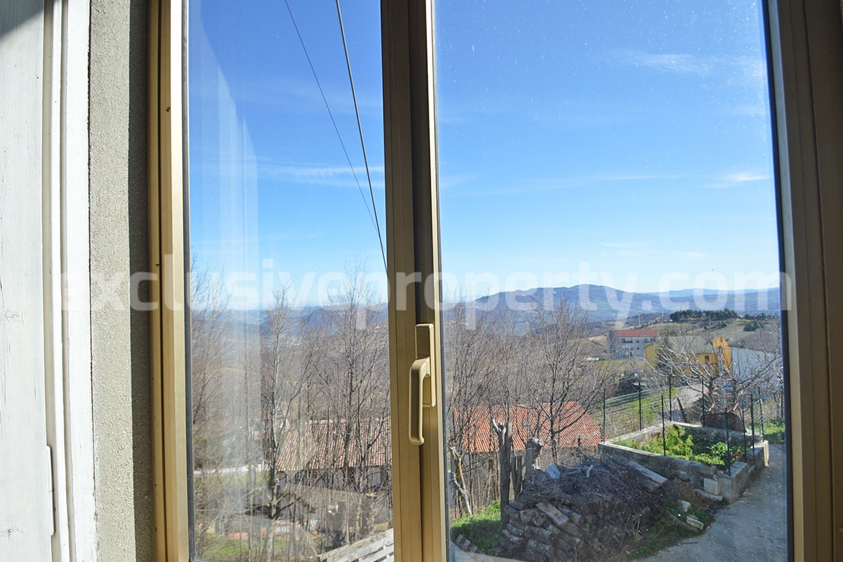 Village House for Sale in Italy with Garden and Garage - Renovation Project in Abruzzo