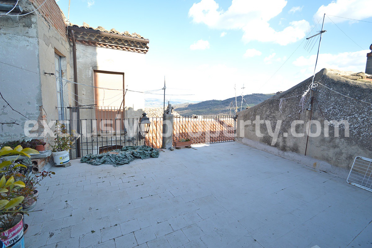 Character property with panoramic terrace for sale in Italy 1