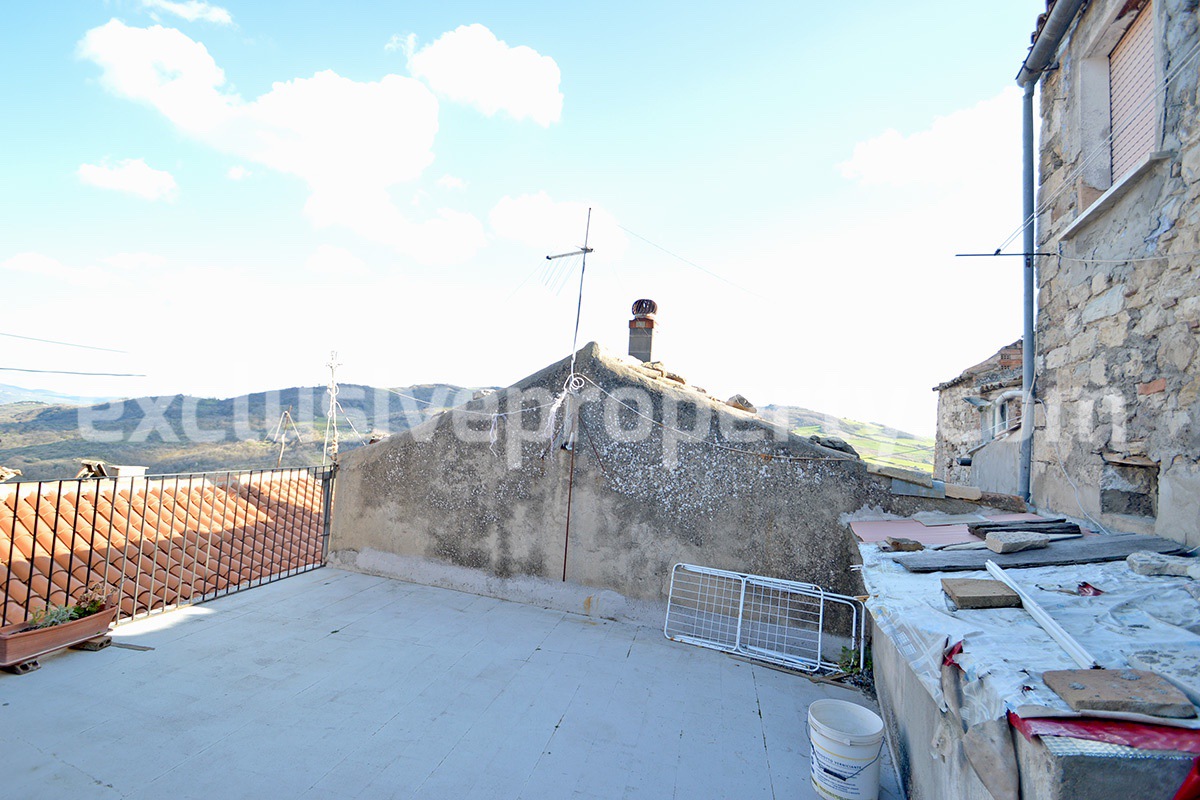 Character property with panoramic terrace for sale in Italy