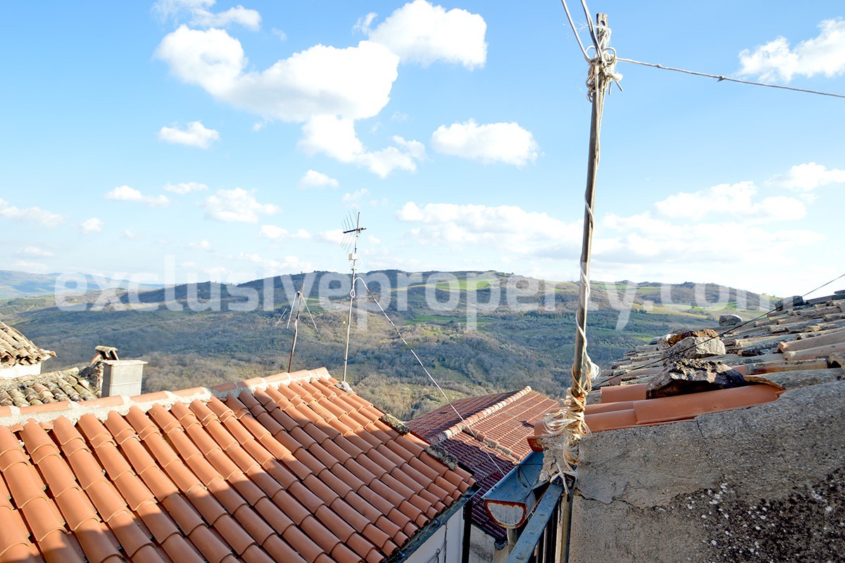 Character property with panoramic terrace for sale in Italy