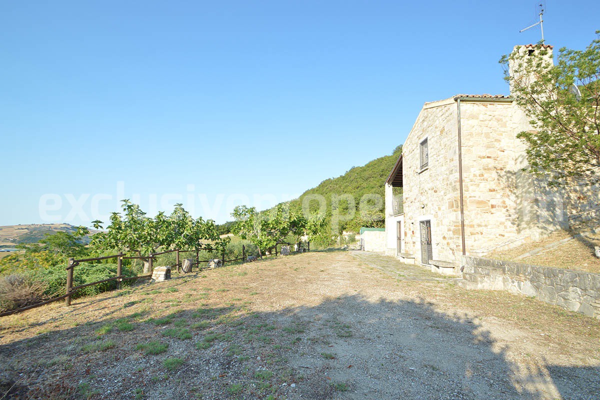 Renovated Stone House for Sale in Italy - Terrace and 5 Hectares of Land with Lake View in Casacalenda - Molise