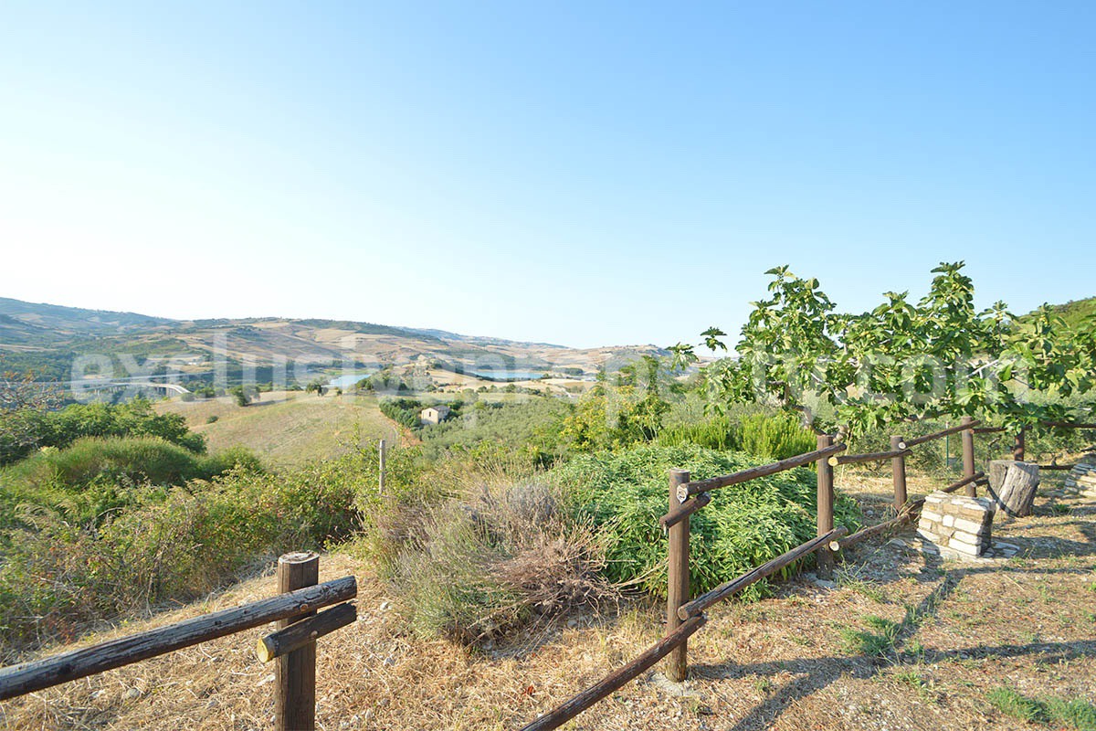 Renovated Stone House for Sale in Italy - Terrace and 5 Hectares of Land with Lake View in Casacalenda - Molise