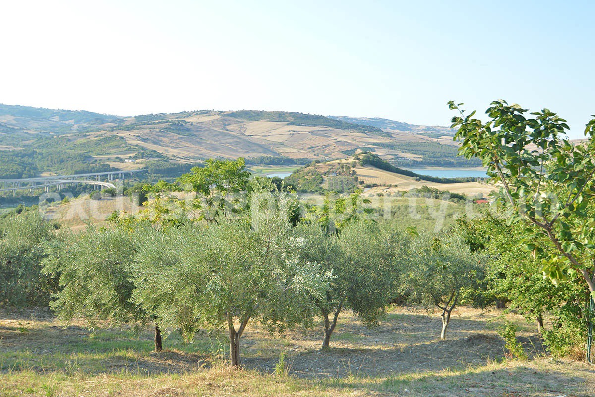 Renovated Stone House for Sale in Italy - Terrace and 5 Hectares of Land with Lake View in Casacalenda - Molise