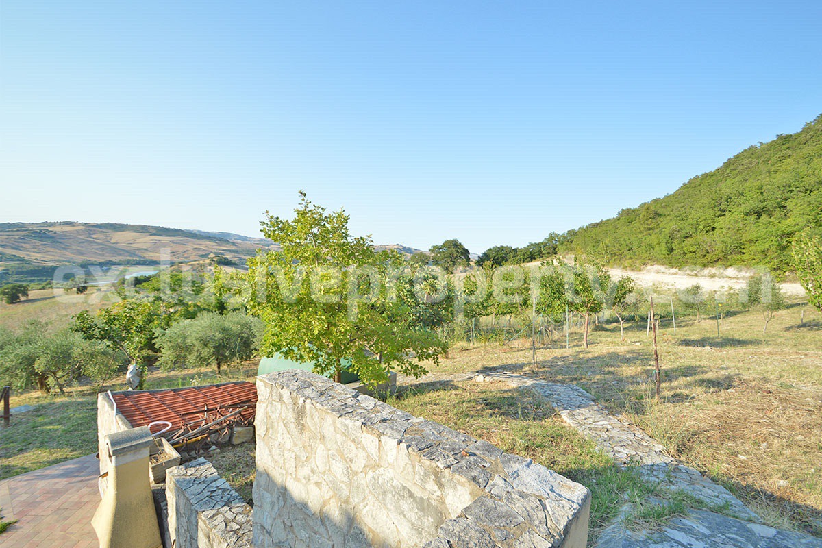 Renovated Stone House for Sale in Italy - Terrace and 5 Hectares of Land with Lake View in Casacalenda - Molise