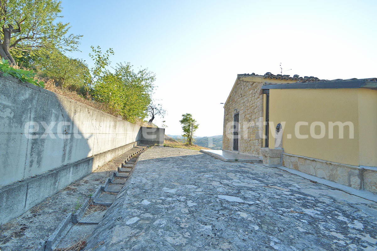 Renovated Stone House for Sale in Italy - Terrace and 5 Hectares of Land with Lake View in Casacalenda - Molise