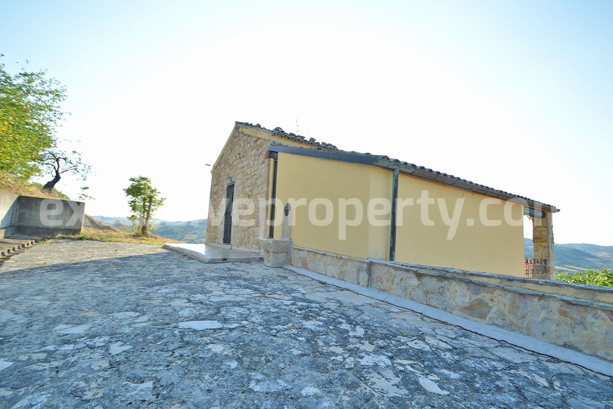 Renovated Stone House for Sale in Italy - Terrace and 5 Hectares of Land with Lake View in Casacalenda - Molise
