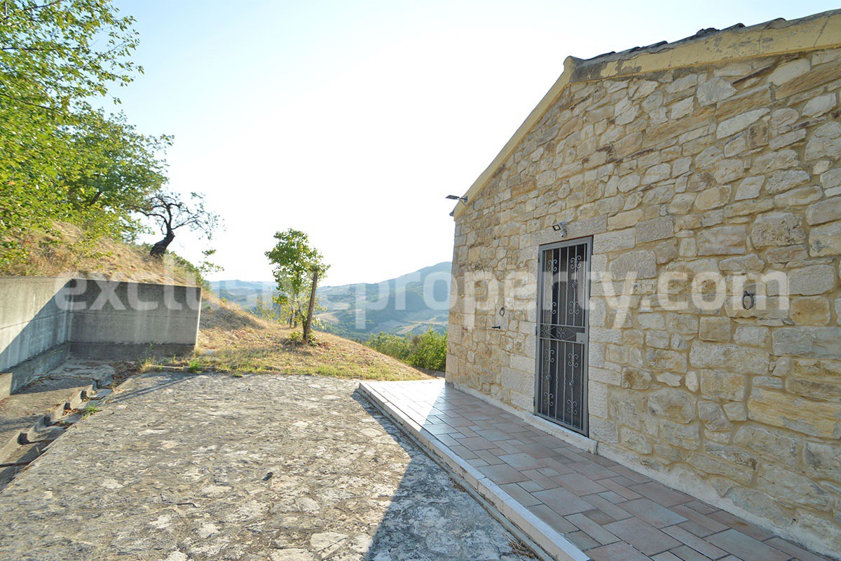 Renovated Stone House for Sale in Italy - Terrace and 5 Hectares of Land with Lake View in Casacalenda - Molise