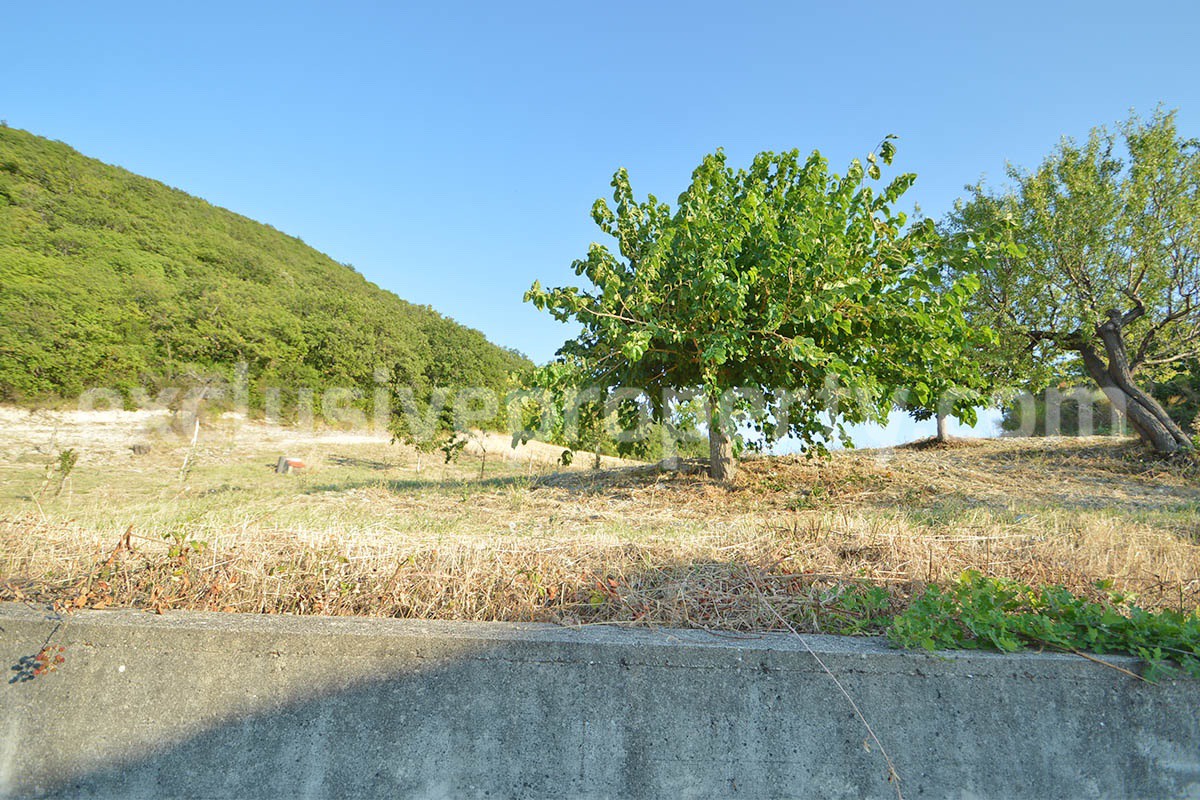 Renovated Stone House for Sale in Italy - Terrace and 5 Hectares of Land with Lake View in Casacalenda - Molise