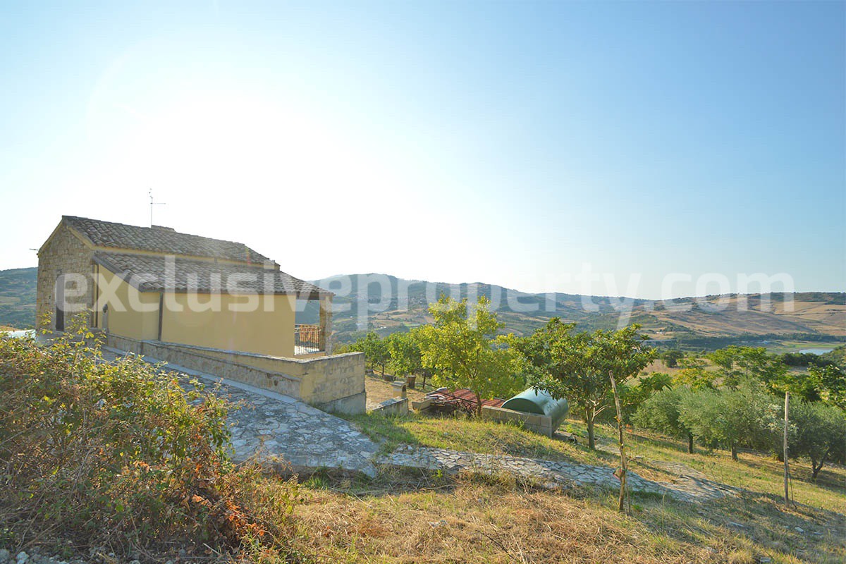 Renovated Stone House for Sale in Italy - Terrace and 5 Hectares of Land with Lake View in Casacalenda - Molise