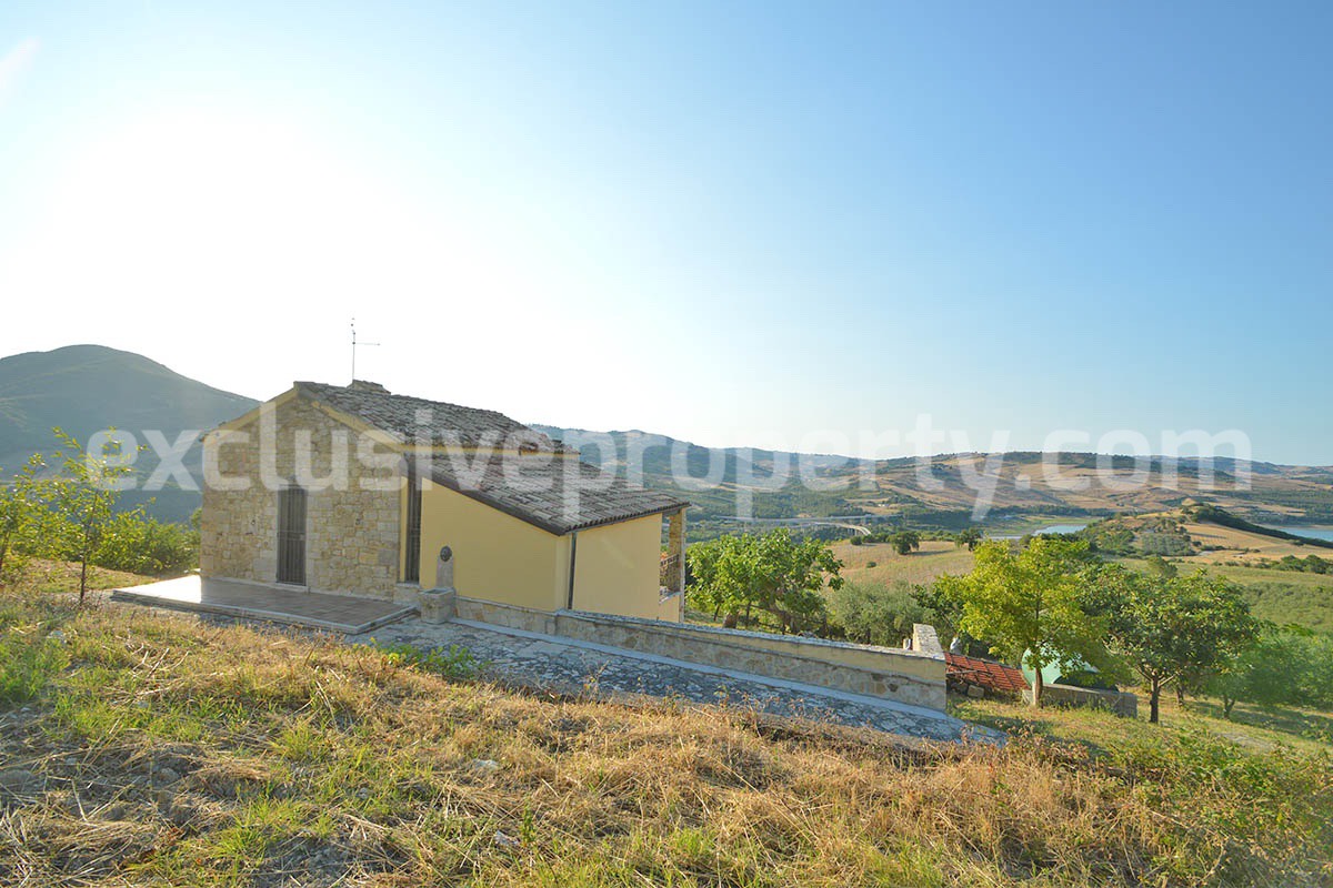 Renovated Stone House for Sale in Italy - Terrace and 5 Hectares of Land with Lake View in Casacalenda - Molise