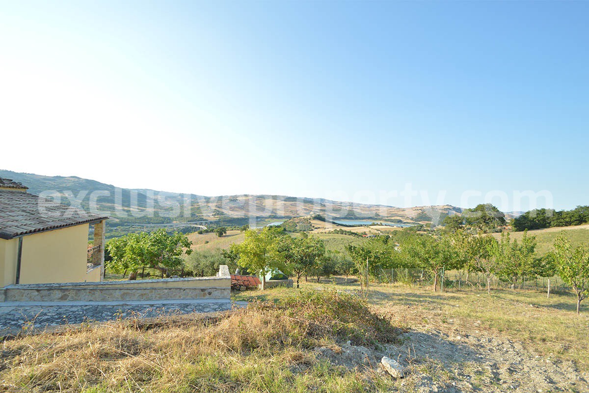 Renovated Stone House for Sale in Italy - Terrace and 5 Hectares of Land with Lake View in Casacalenda - Molise