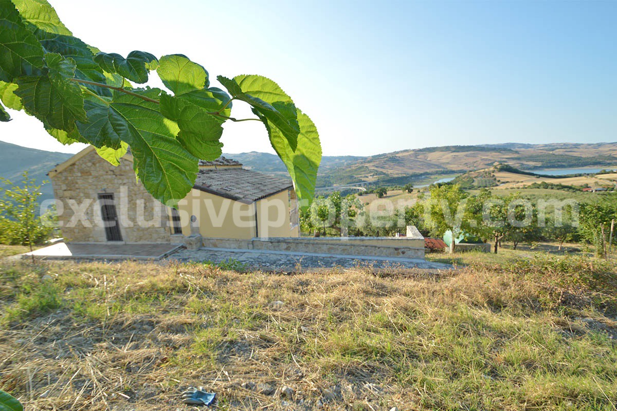 Renovated Stone House for Sale in Italy - Terrace and 5 Hectares of Land with Lake View in Casacalenda - Molise
