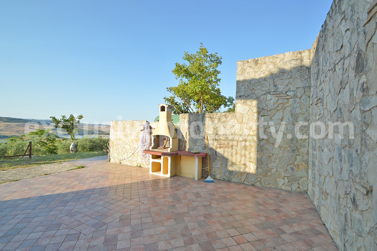 Renovated Stone House for Sale in Italy - Terrace and 5 Hectares of Land with Lake View in Casacalenda - Molise