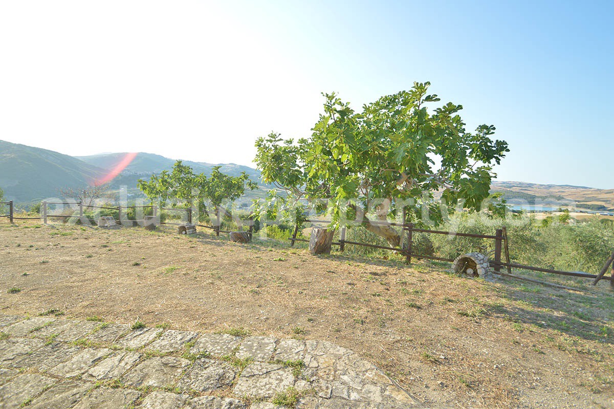 Renovated Stone House for Sale in Italy - Terrace and 5 Hectares of Land with Lake View in Casacalenda - Molise