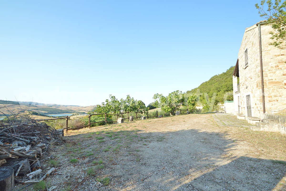Renovated Stone House for Sale in Italy - Terrace and 5 Hectares of Land with Lake View in Casacalenda - Molise