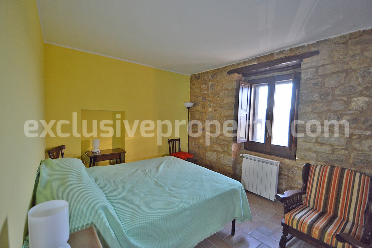 Renovated Stone House for Sale in Italy - Terrace and 5 Hectares of Land with Lake View in Casacalenda - Molise