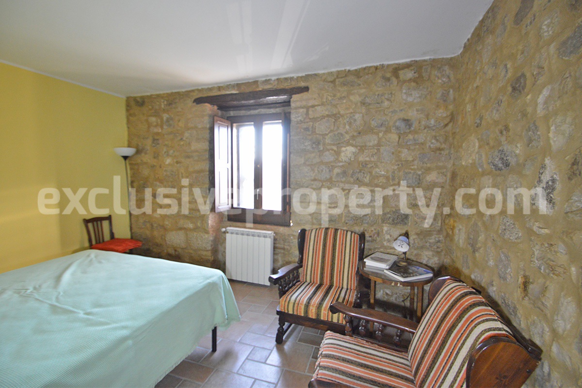 Renovated Stone House for Sale in Italy - Terrace and 5 Hectares of Land with Lake View in Casacalenda - Molise