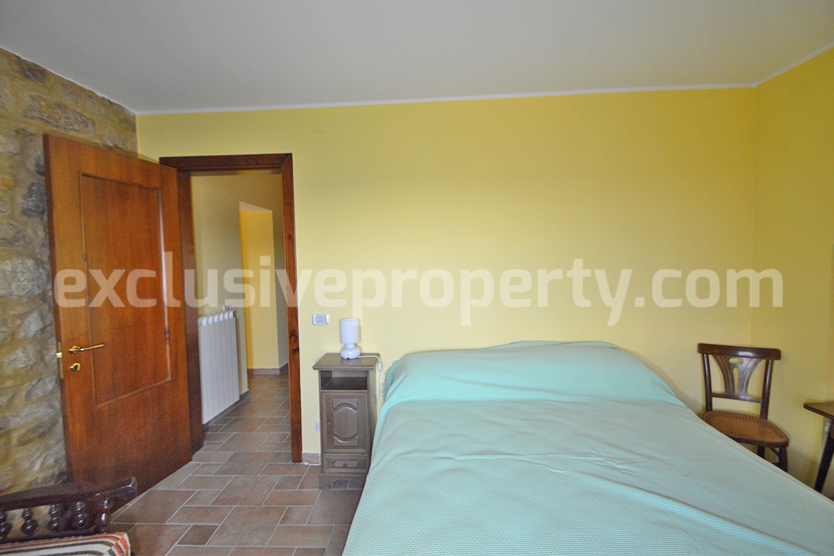 Renovated Stone House for Sale in Italy - Terrace and 5 Hectares of Land with Lake View in Casacalenda - Molise