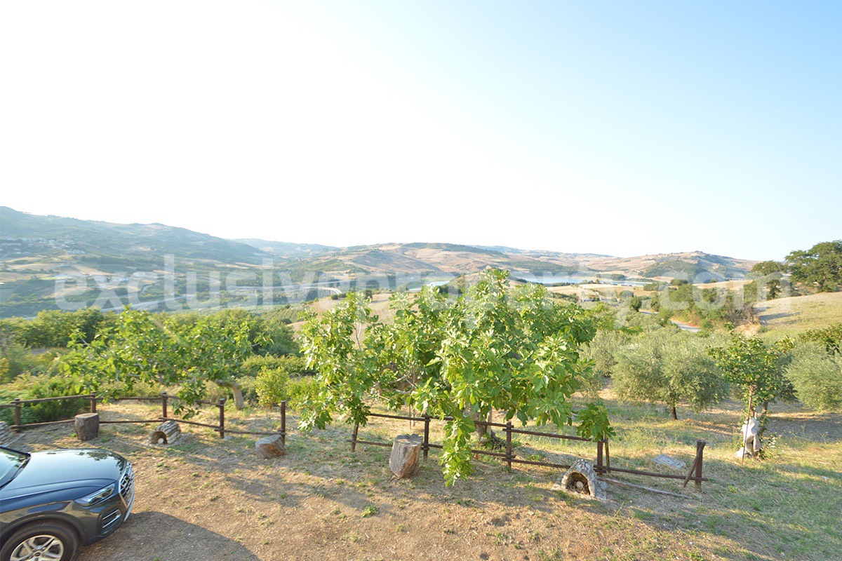Renovated Stone House for Sale in Italy - Terrace and 5 Hectares of Land with Lake View in Casacalenda - Molise