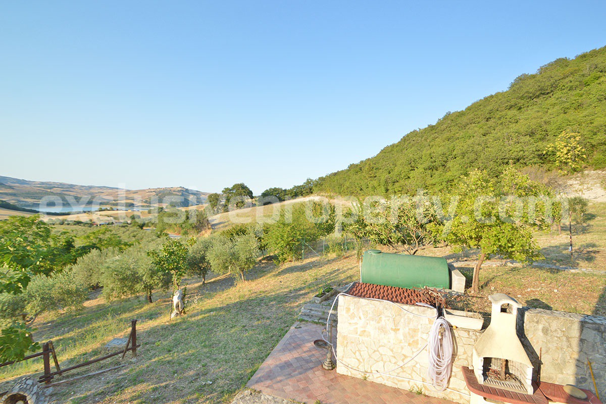Renovated Stone House for Sale in Italy - Terrace and 5 Hectares of Land with Lake View in Casacalenda - Molise