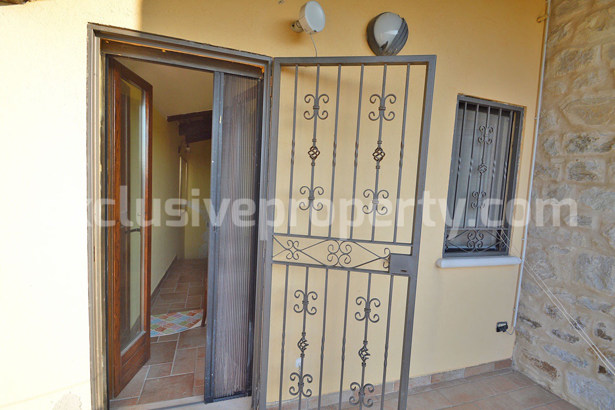 Renovated Stone House for Sale in Italy - Terrace and 5 Hectares of Land with Lake View in Casacalenda - Molise