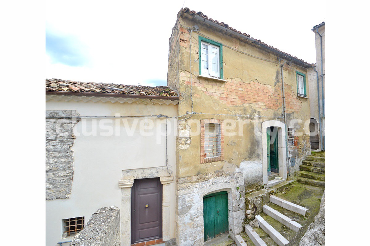 Ancient stone and brick property in the medieval village for sale in Italy 1