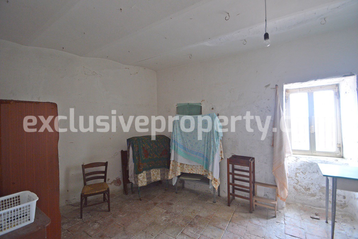 Ancient stone and brick property in the medieval village for sale in Italy 5
