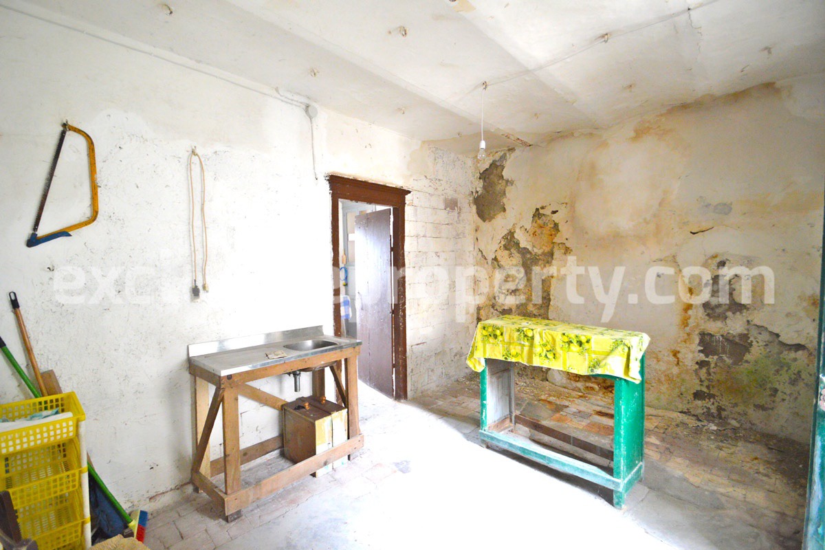Ancient stone and brick property in the medieval village for sale in Italy 11