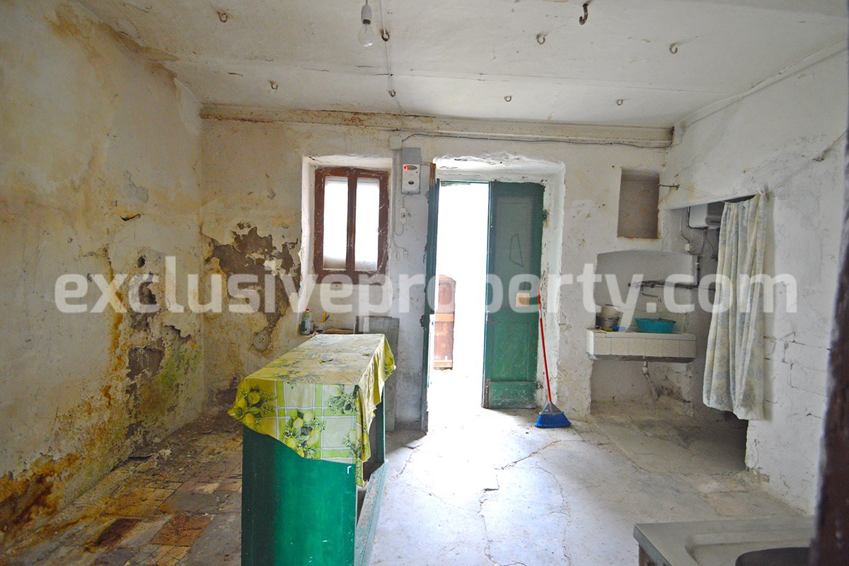 Ancient stone and brick property in the medieval village for sale in Italy 12