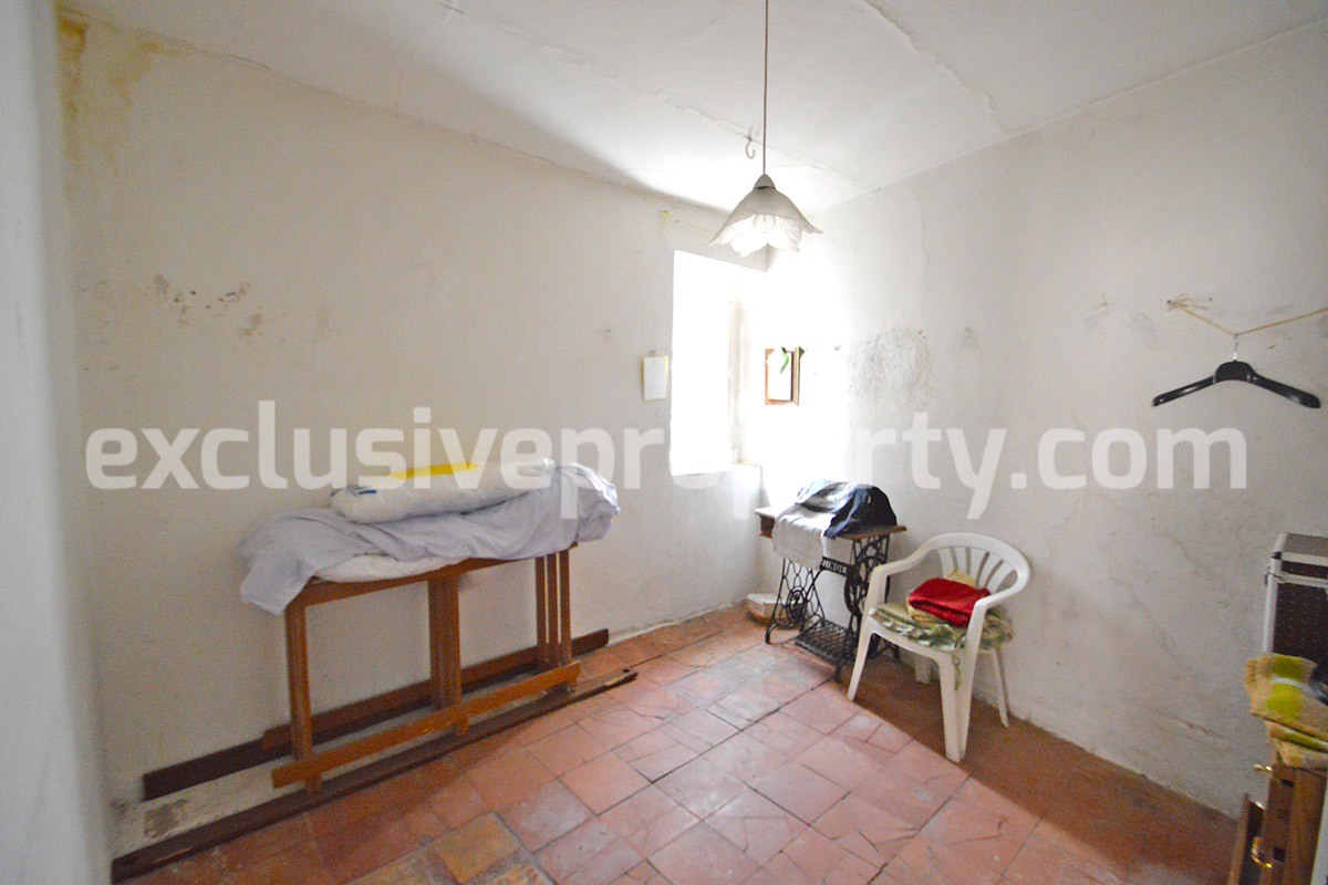Ancient stone and brick property in the medieval village for sale in Italy 14
