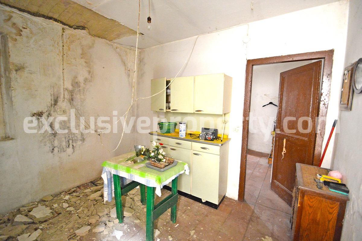 Ancient stone and brick property in the medieval village for sale in Italy