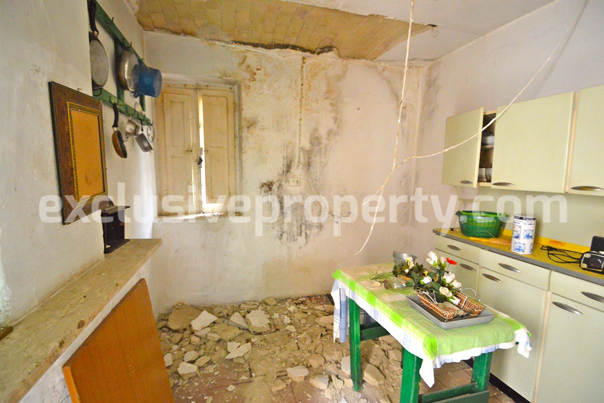 Ancient stone and brick property in the medieval village for sale in Italy