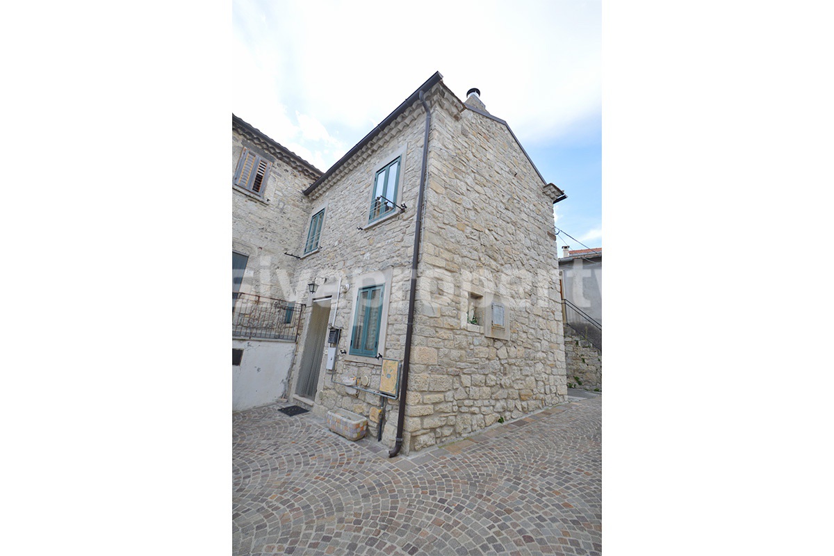 Cozy Stone Townhouse for Sale in Castelguidone in Abruzzo - Move-In Ready with Thermo-Fireplace