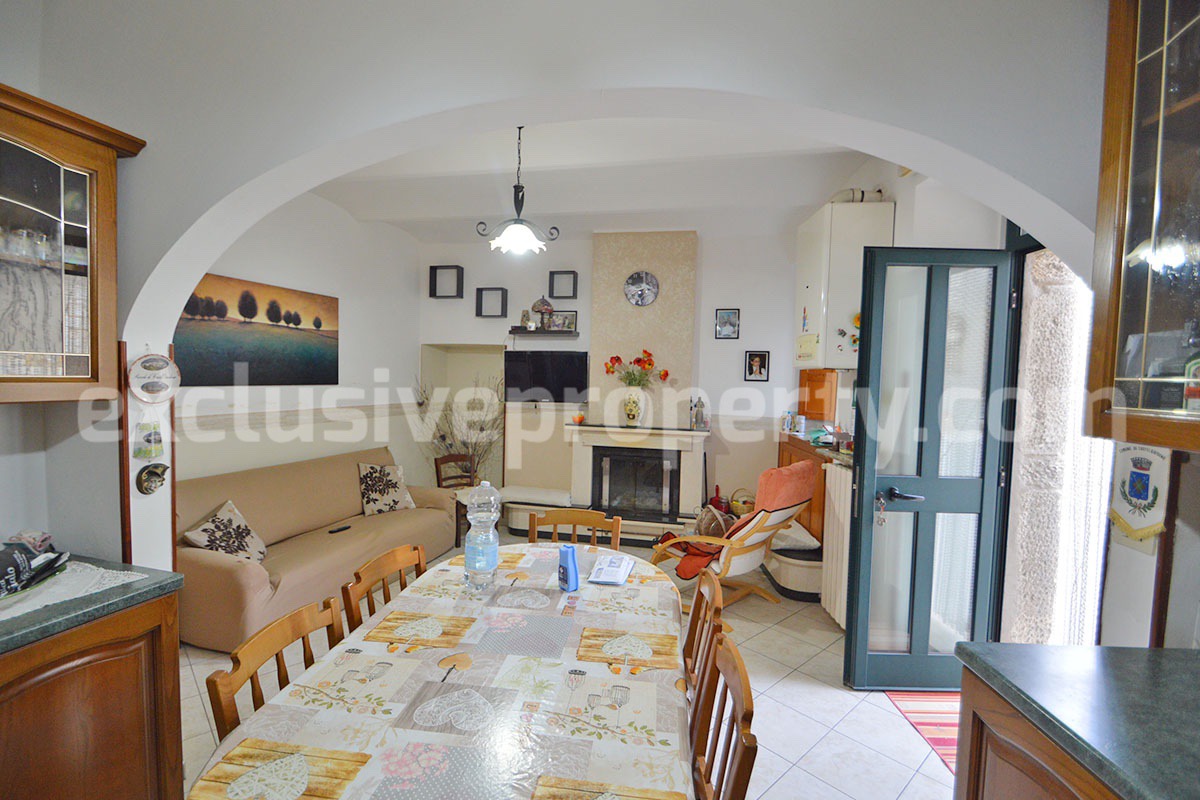 Cozy Stone Townhouse for Sale in Castelguidone in Abruzzo - Move-In Ready with Thermo-Fireplace