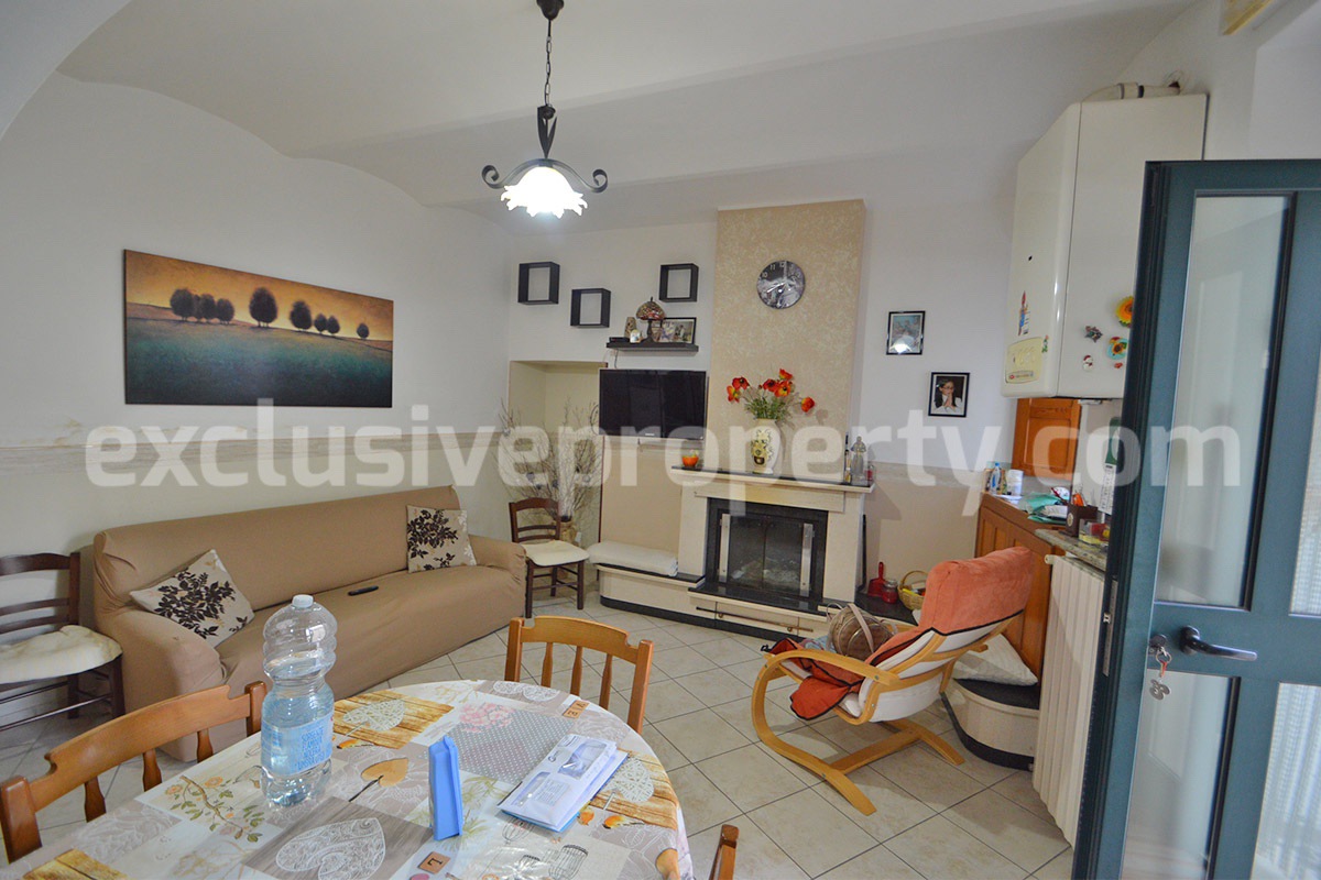 Cozy Stone Townhouse for Sale in Castelguidone in Abruzzo - Move-In Ready with Thermo-Fireplace