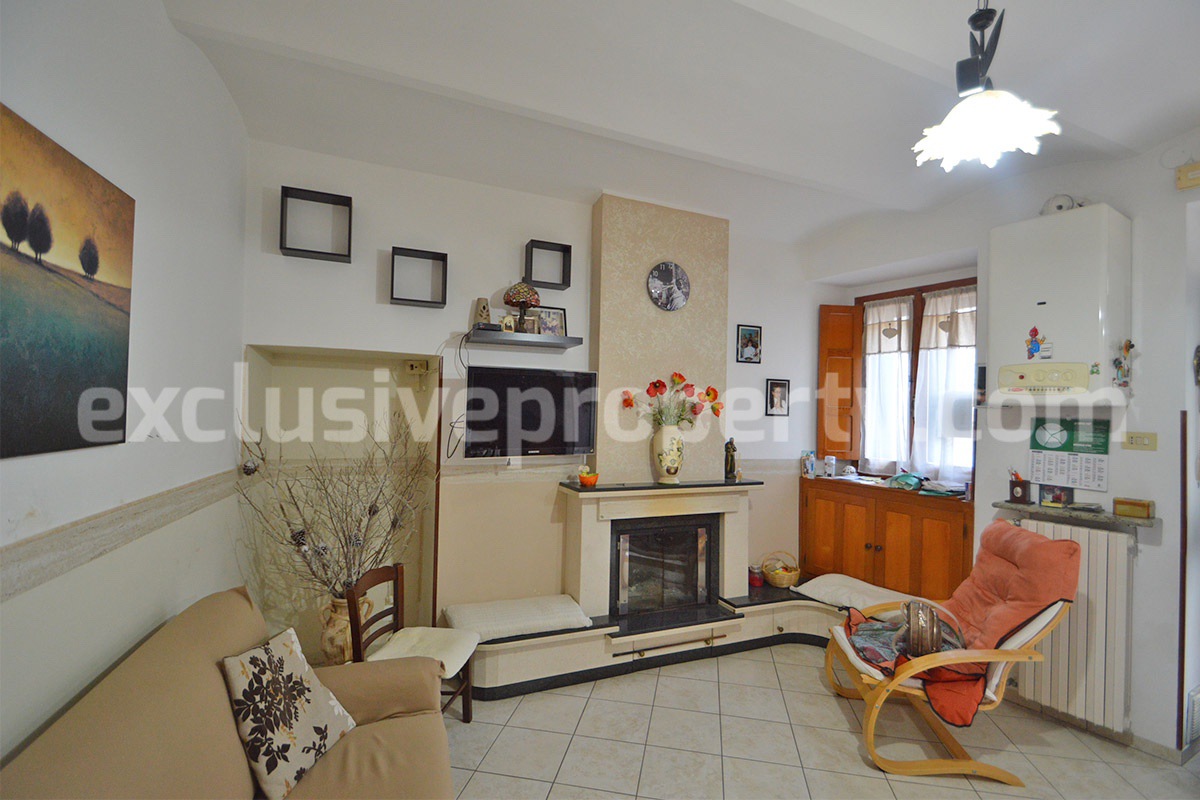 Cozy Stone Townhouse for Sale in Castelguidone in Abruzzo - Move-In Ready with Thermo-Fireplace