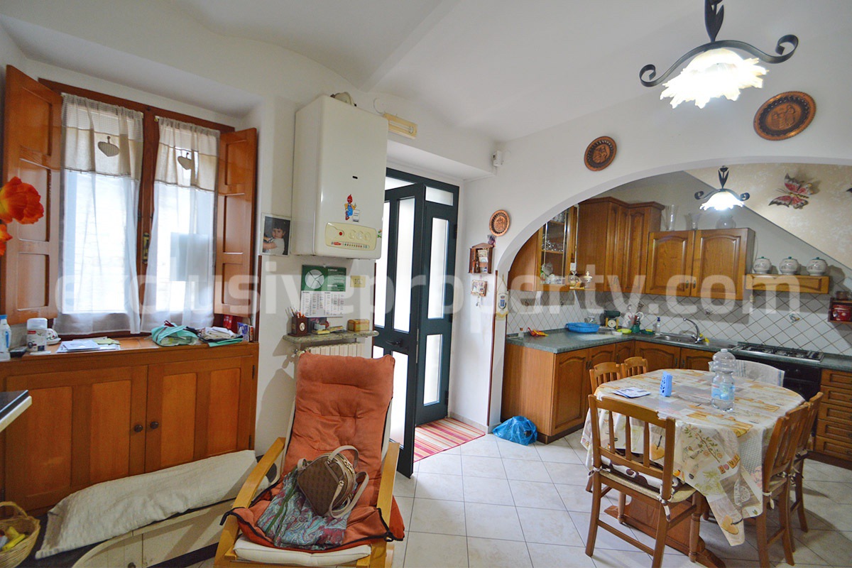 Cozy Stone Townhouse for Sale in Castelguidone in Abruzzo - Move-In Ready with Thermo-Fireplace