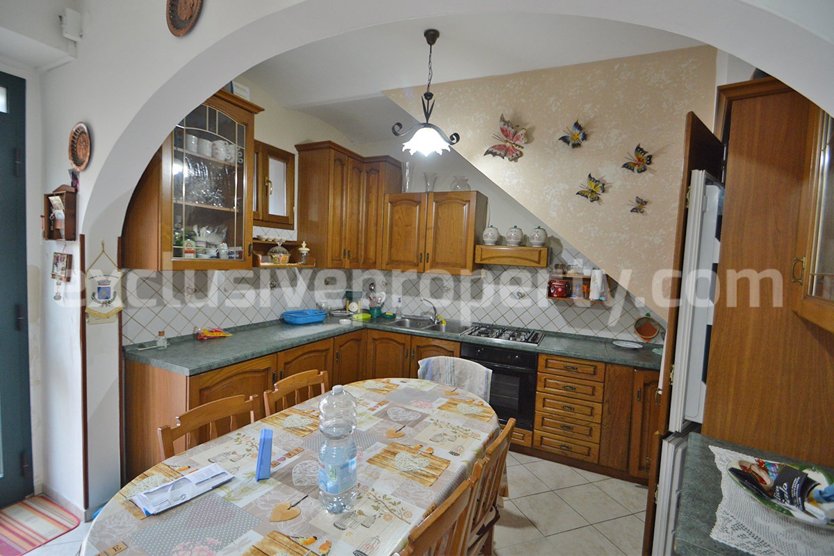 Cozy Stone Townhouse for Sale in Castelguidone in Abruzzo - Move-In Ready with Thermo-Fireplace