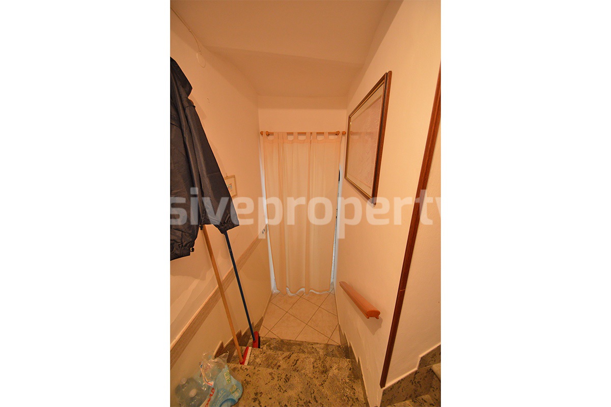 Cozy Stone Townhouse for Sale in Castelguidone in Abruzzo - Move-In Ready with Thermo-Fireplace