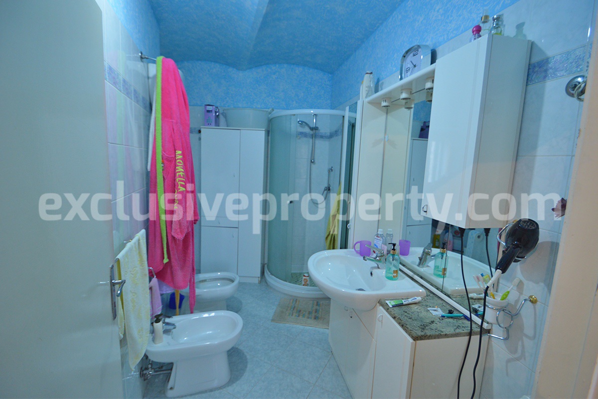 Cozy Stone Townhouse for Sale in Castelguidone in Abruzzo - Move-In Ready with Thermo-Fireplace