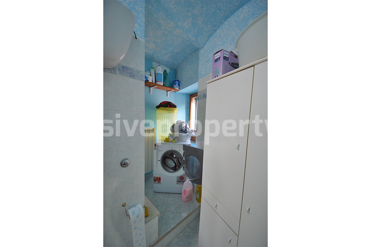 Cozy Stone Townhouse for Sale in Castelguidone in Abruzzo - Move-In Ready with Thermo-Fireplace