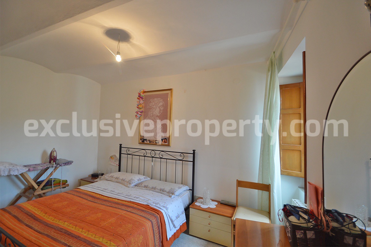 Cozy Stone Townhouse for Sale in Castelguidone in Abruzzo - Move-In Ready with Thermo-Fireplace