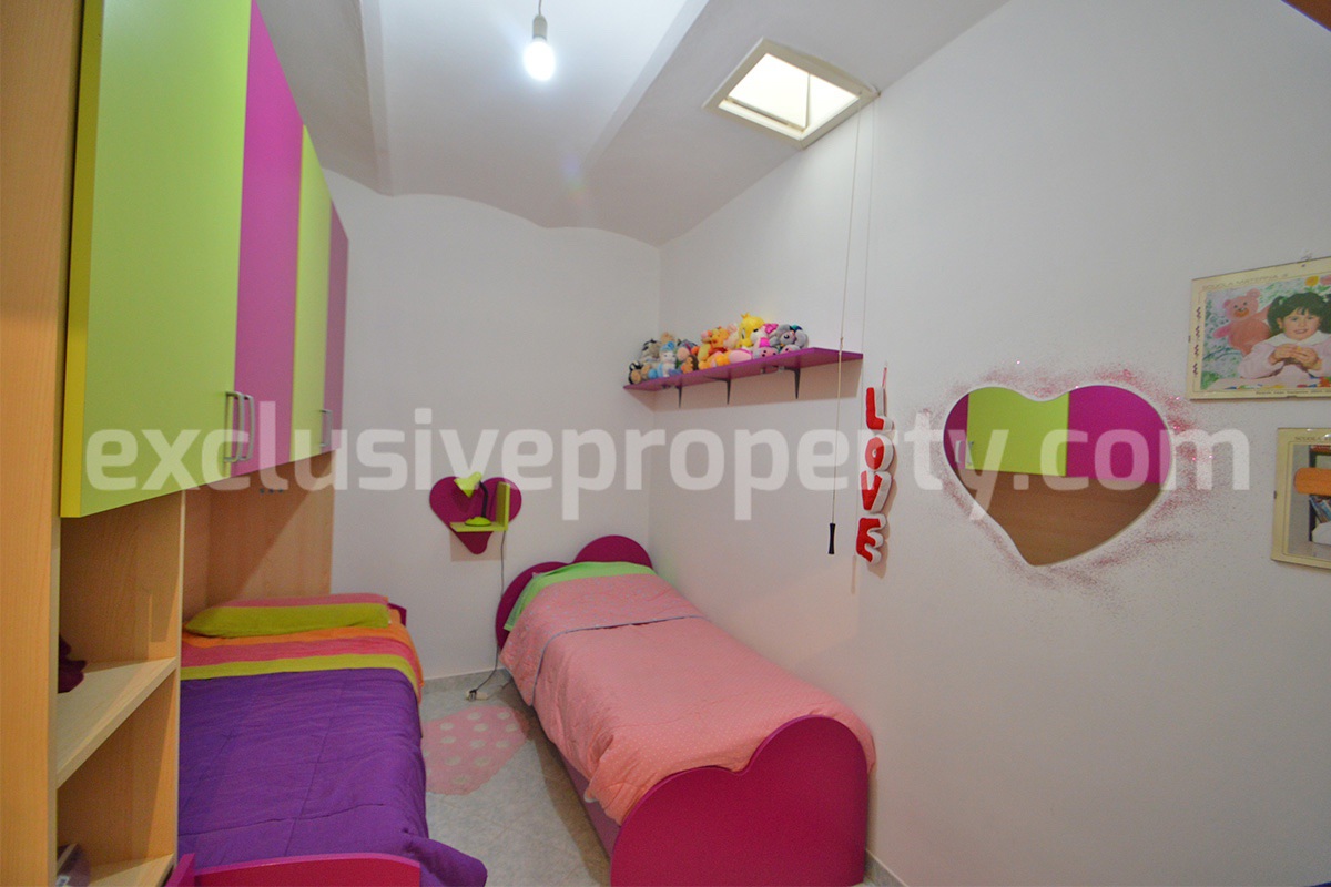 Cozy Stone Townhouse for Sale in Castelguidone in Abruzzo - Move-In Ready with Thermo-Fireplace