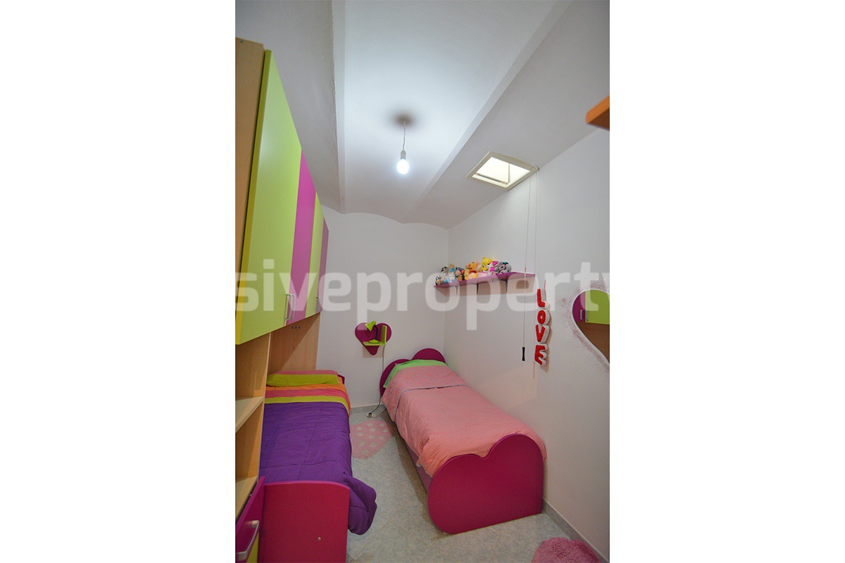 Cozy Stone Townhouse for Sale in Castelguidone in Abruzzo - Move-In Ready with Thermo-Fireplace